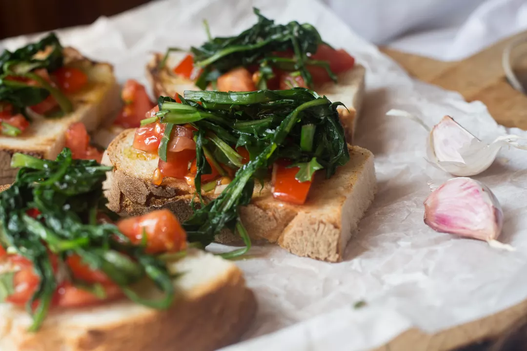 Recipe: Bruschetta with Sautéed Dandelion Greens and Tomatoes