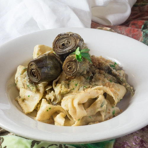 Home made italian pasta with artichokes and  bread crumbs