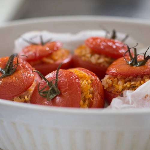 Rice stuffed vegan tomato in Roman style
