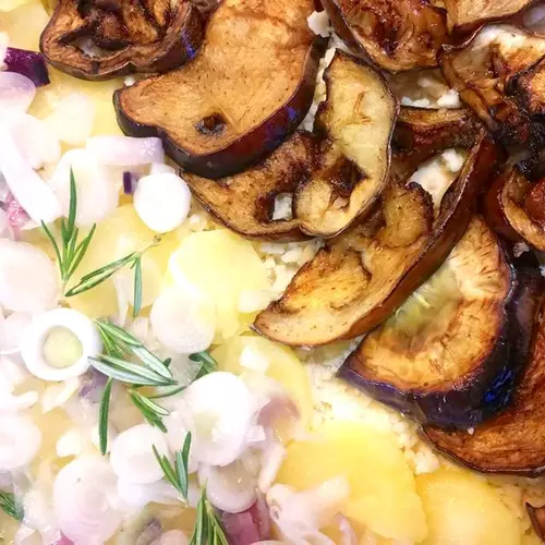 Focaccia with aubergines, onions, potatoes and rosemary